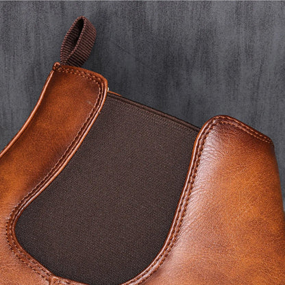 Men's Chelsea boots featuring a classic genuine leather design, elastic side panel for easy wear, and a sturdy rubber sole for durability and comfort. 4