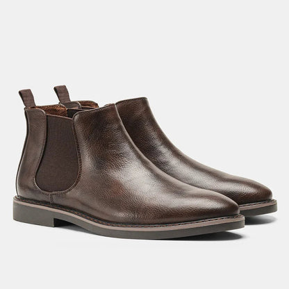 Men's Chelsea boots featuring a classic genuine leather design, elastic side panel for easy wear, and a sturdy rubber sole for durability and comfort. 5