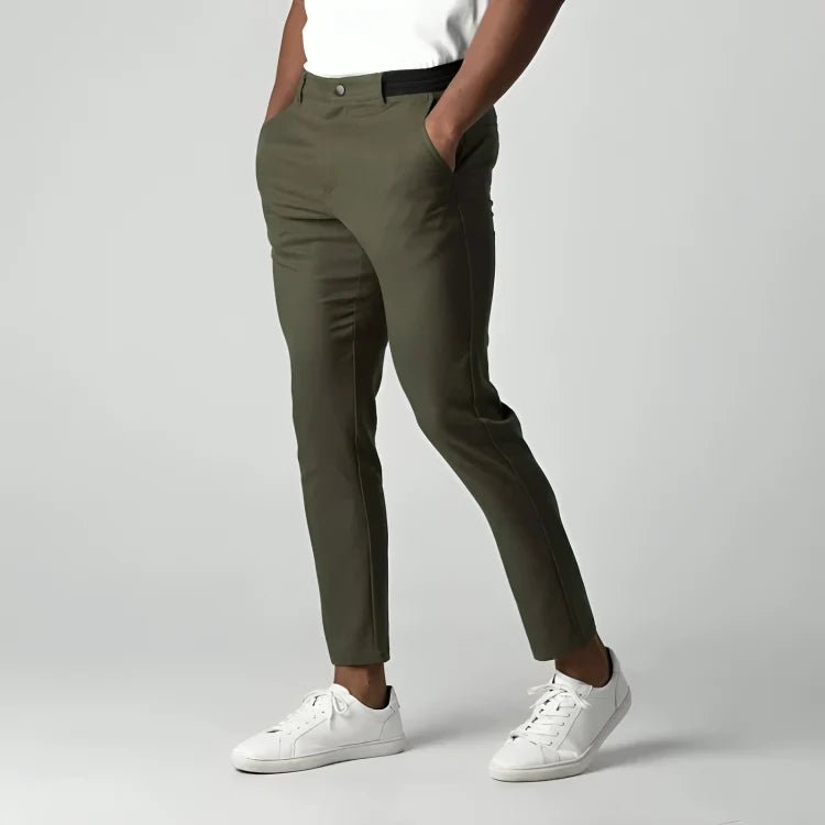 Men's slim fit chino pants with tapered leg design, made from stretch fabric for all-day comfort and style. 5