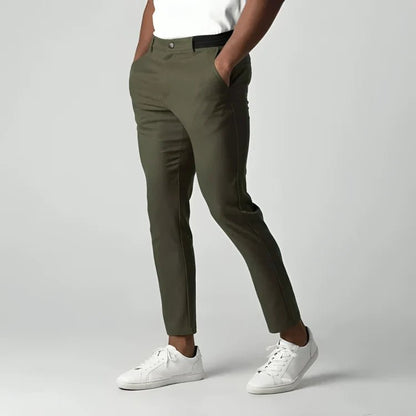 Men's slim fit chino pants with tapered leg design, made from stretch fabric for all-day comfort and style. 5