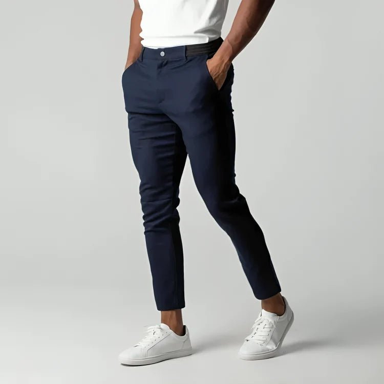 Men's slim fit chino pants with tapered leg design, made from stretch fabric for all-day comfort and style. 4