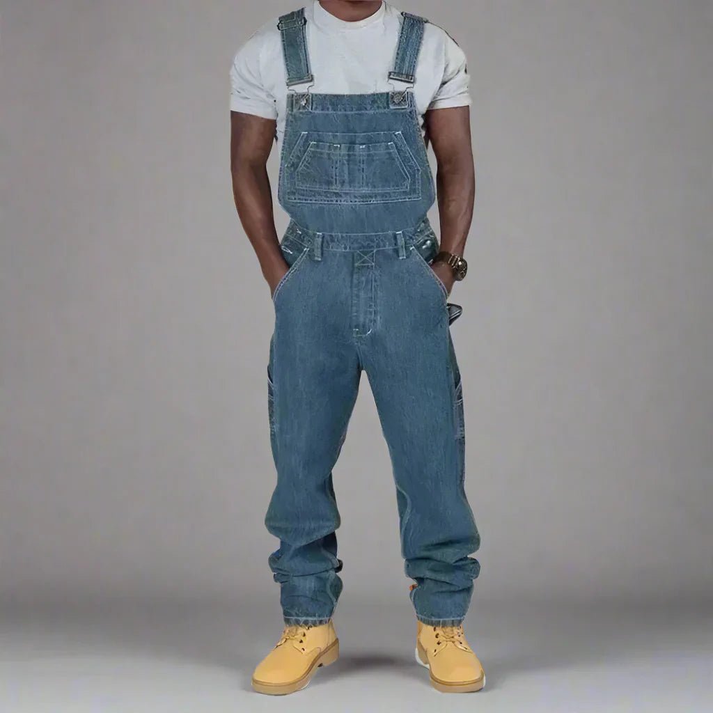 Men's denim overalls featuring modern splice details, crafted from a comfortable cotton blend, perfect for casual streetwear style. 3