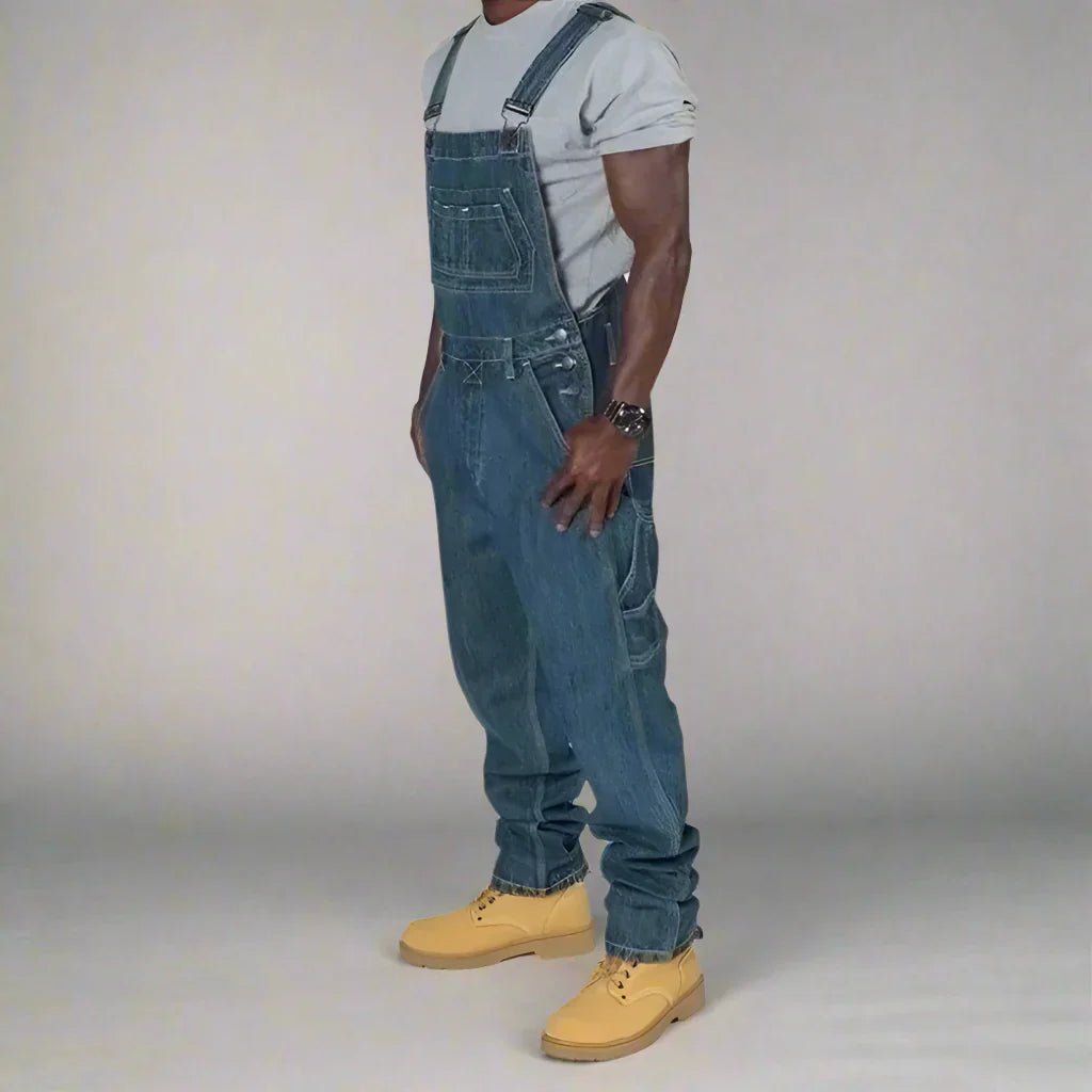 Men's denim overalls featuring modern splice details, crafted from a comfortable cotton blend, perfect for casual streetwear style. 0