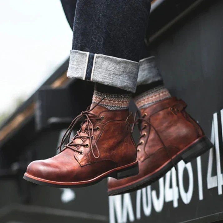 Men's high-top leather boots featuring a cushioned footbed, ideal for urban and outdoor wear, available in black and brown colors. 4