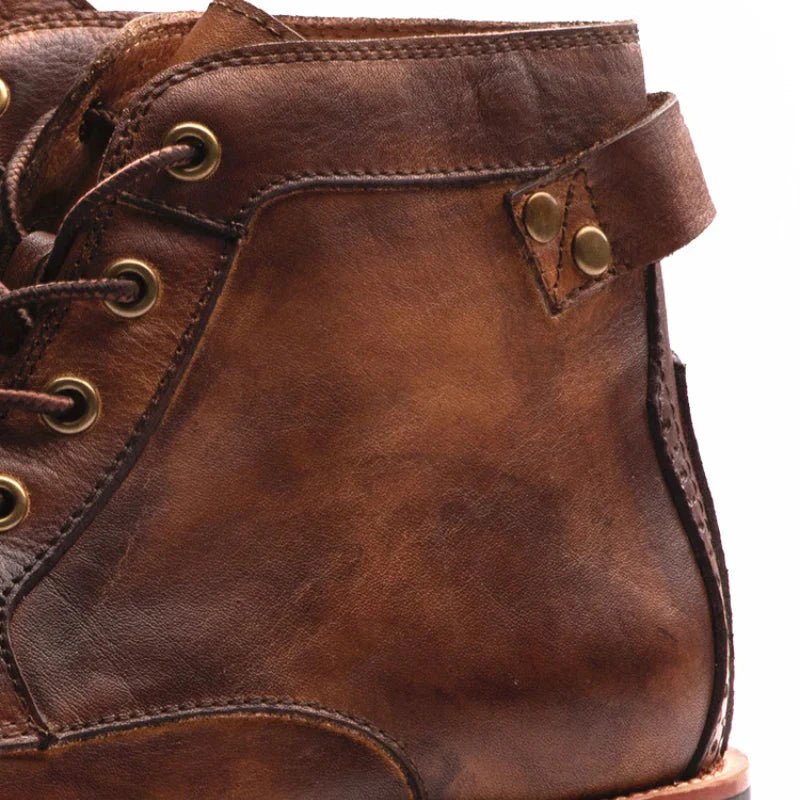 Men's high-top leather boots featuring a cushioned footbed, ideal for urban and outdoor wear, available in black and brown colors. 6