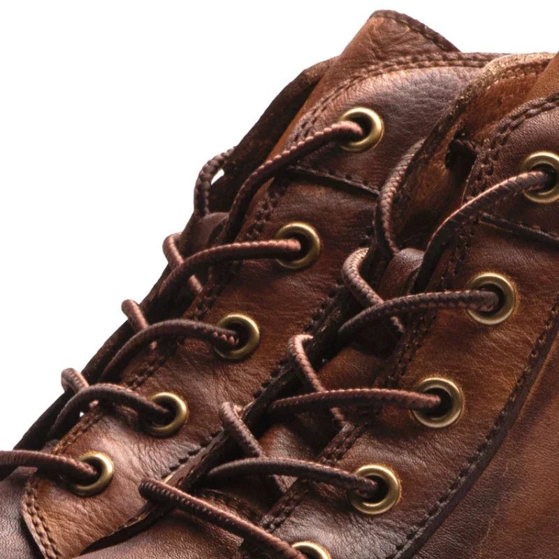 Men's high-top leather boots featuring a cushioned footbed, ideal for urban and outdoor wear, available in black and brown colors. 5