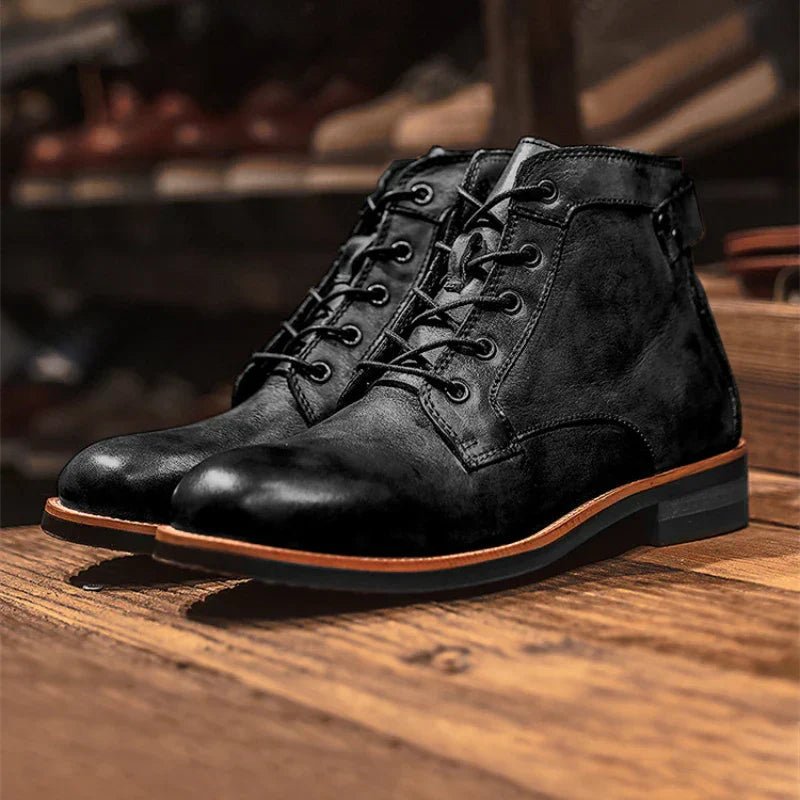 Men's high-top leather boots featuring a cushioned footbed, ideal for urban and outdoor wear, available in black and brown colors. 2