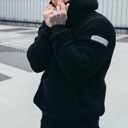 Men's hoodie featuring a relaxed fit and soft plush fabric, perfect for comfortable casual wear. 3