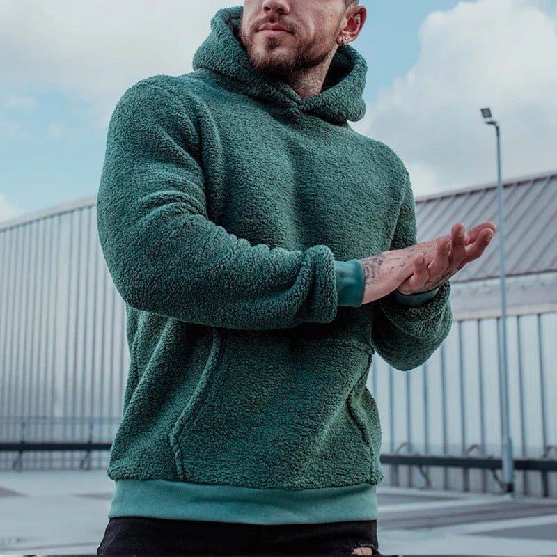 Men's hoodie featuring a relaxed fit and soft plush fabric, perfect for comfortable casual wear. 1