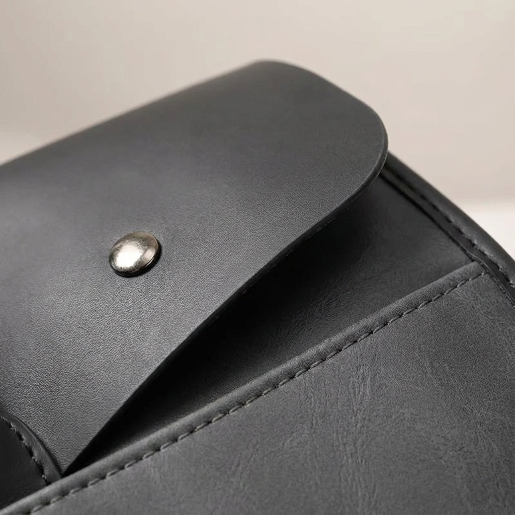 Men's laptop bag featuring a durable PU leather retro design, equipped with an adjustable strap, designed to fit 14-inch laptops. 3