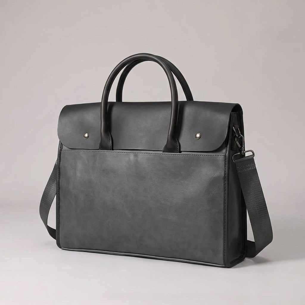 Men's laptop bag featuring a durable PU leather retro design, equipped with an adjustable strap, designed to fit 14-inch laptops. 2