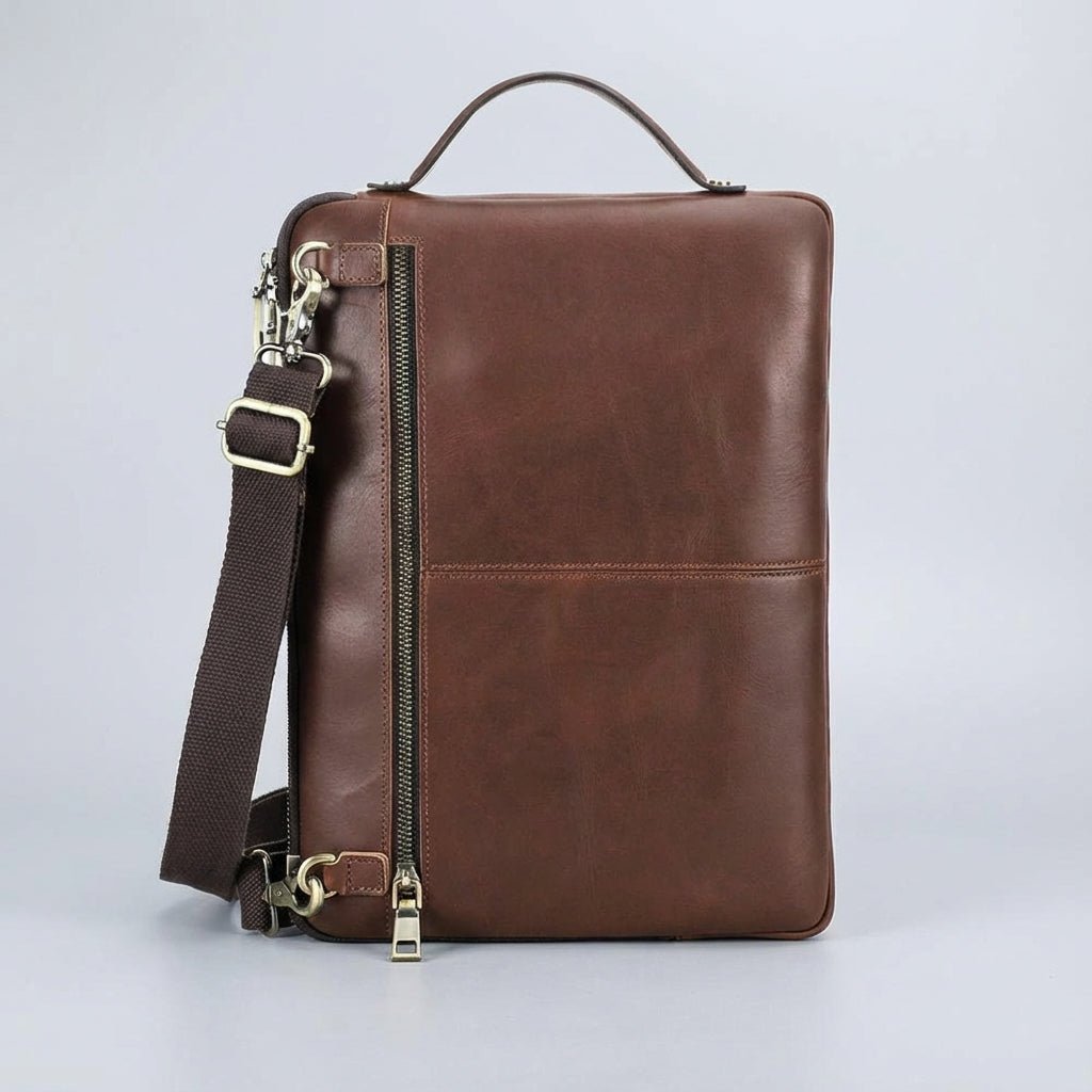 Men's genuine brown leather laptop bag featuring a padded compartment for MacBook and laptop protection, designed for style and functionality. 0