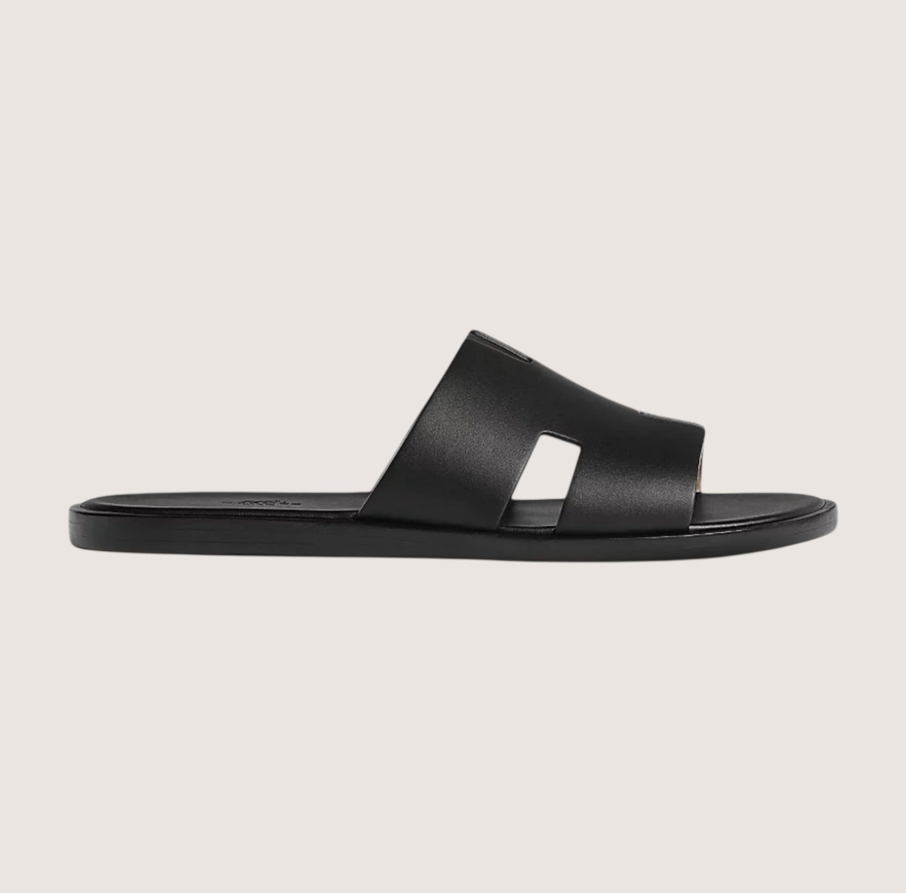Men's black leather slide sandals featuring a cushioned insole and open-toe design, perfect for casual and smart-casual occasions. 1