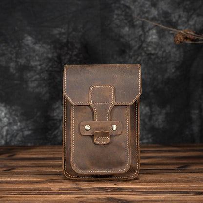 Men's leather waist bag featuring multiple compartments, designed for durability and everyday use, perfect for keeping essentials organized and accessible. 11