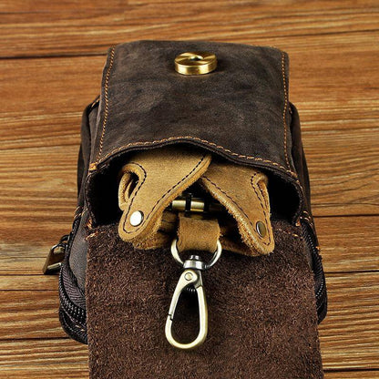 Men's leather waist bag featuring multiple compartments, designed for durability and everyday use, perfect for keeping essentials organized and accessible. 7