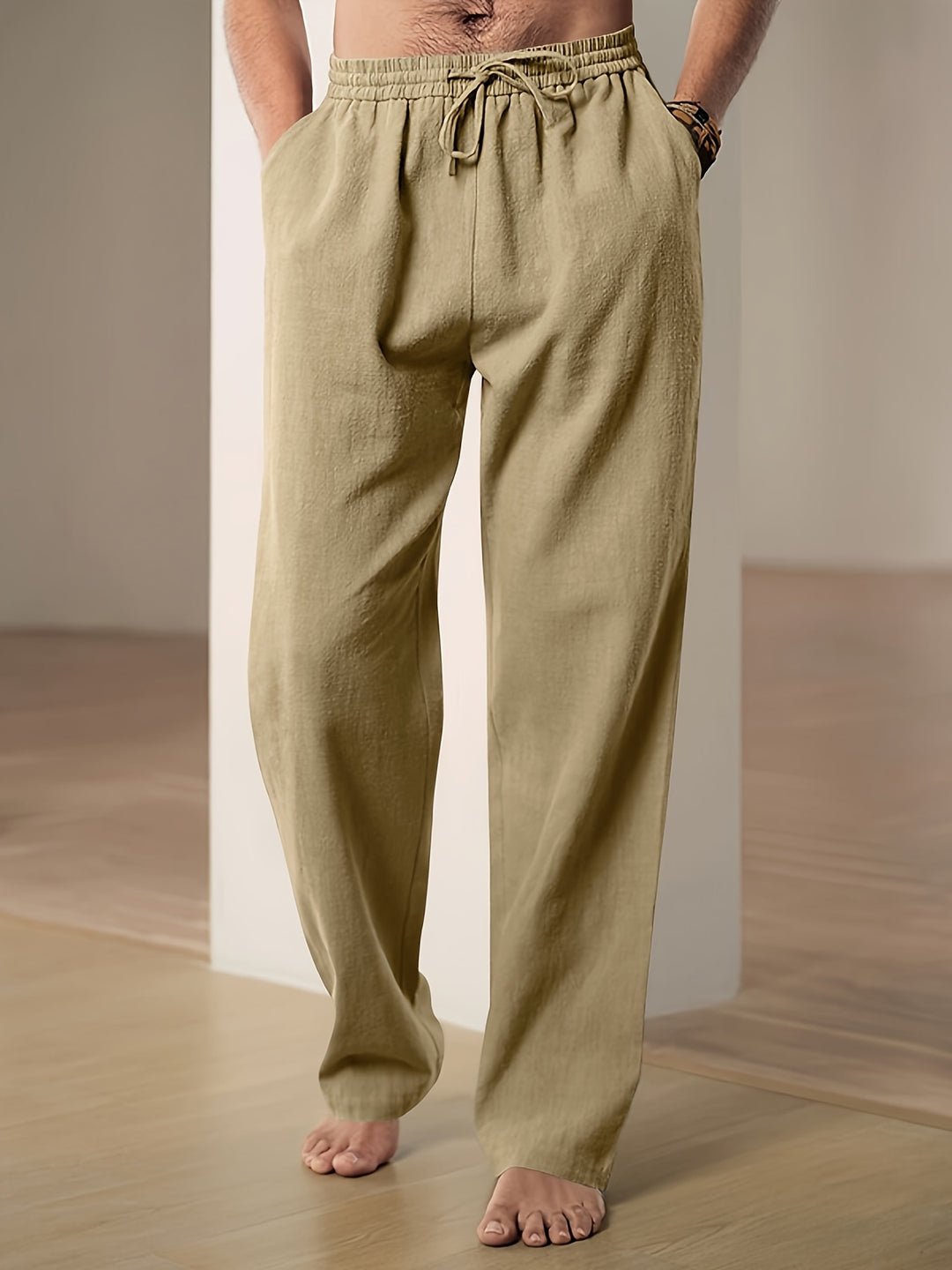 Men's linen pants featuring an elastic waist and loose fit, designed for breathability and all-day comfort, perfect for casual wear. 4