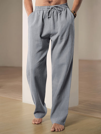 Men's linen pants featuring an elastic waist and loose fit, designed for breathability and all-day comfort, perfect for casual wear. 5