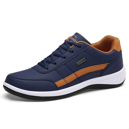 Men's orthopedic leather sneakers featuring a cushioned sole, designed for comfort and versatility, perfect for casual wear and everyday activities. 2