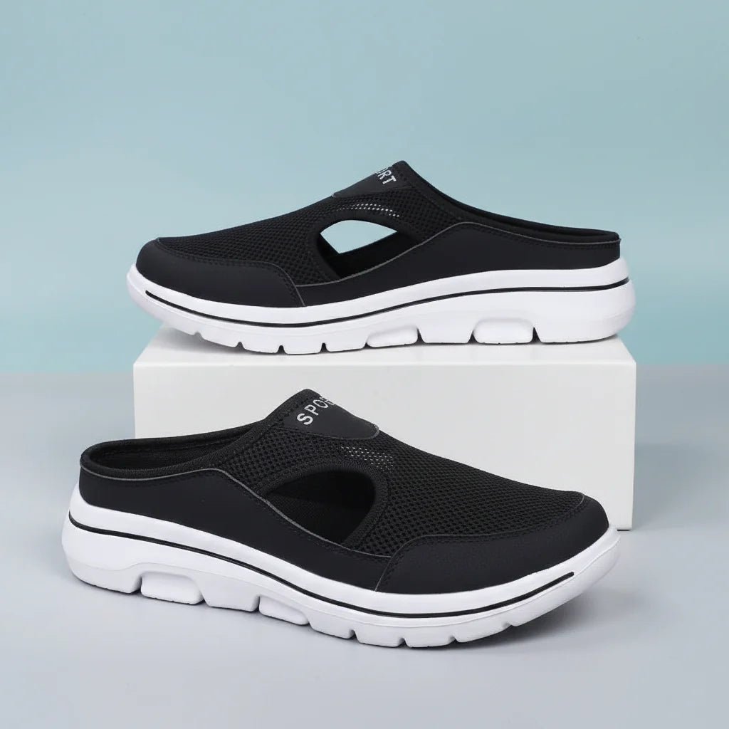 Men's orthopedic slip-on slippers featuring a breathable mesh upper, designed for wide fit comfort, perfect for both indoor and outdoor wear. 0