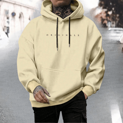 Men's oversized cotton hoodie featuring an adjustable hood and front pocket, ideal for casual wear and comfort. 1