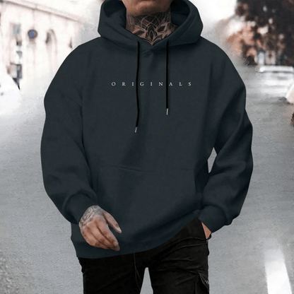 Men's oversized cotton hoodie featuring an adjustable hood and front pocket, ideal for casual wear and comfort. 0