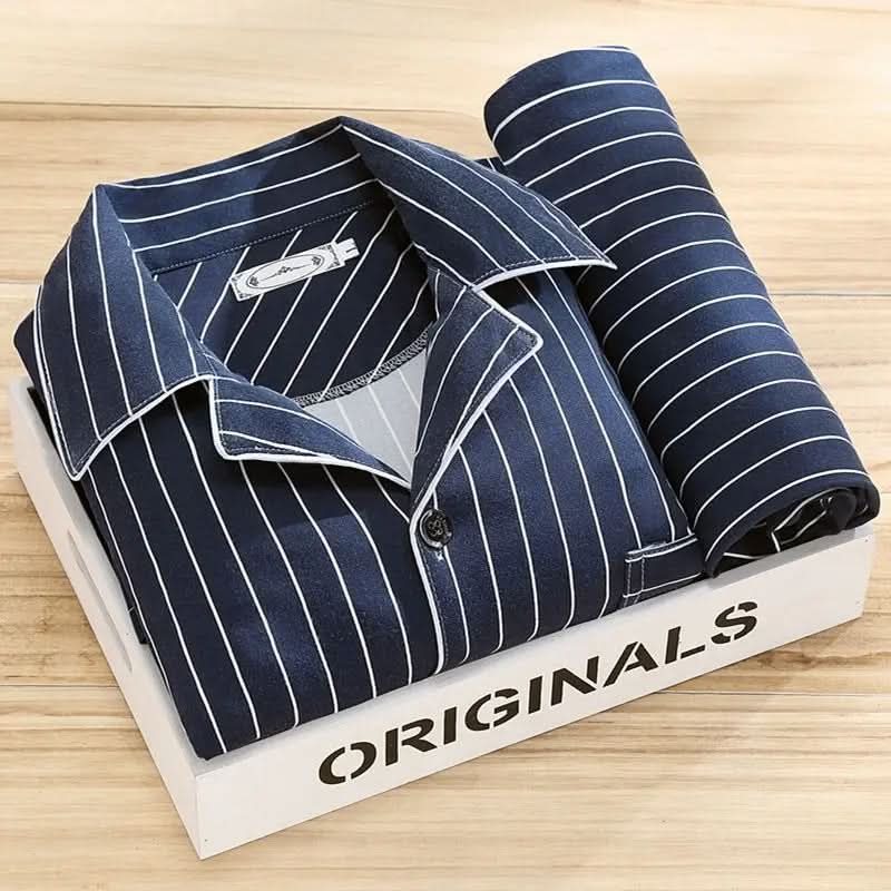 Men's pajama set featuring a button-down shirt and matching pants, designed for year-round comfort with soft, breathable fabric, ideal for restful sleep. 6
