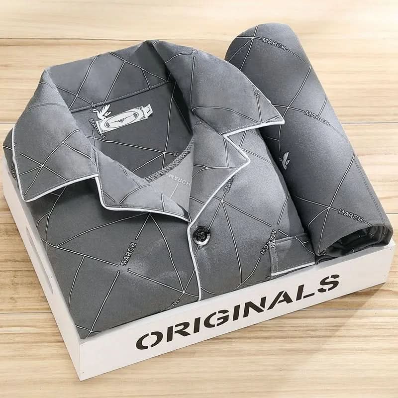 Men's pajama set featuring a button-down shirt and matching pants, designed for year-round comfort with soft, breathable fabric, ideal for restful sleep. 3