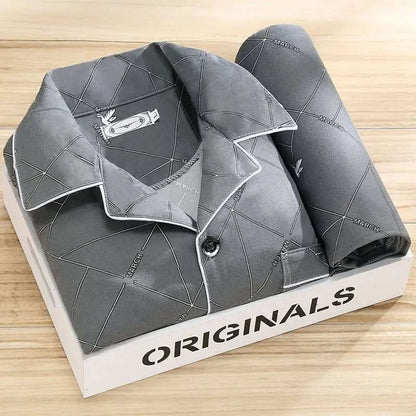 Men's pajama set featuring a button-down shirt and matching pants, designed for year-round comfort with soft, breathable fabric, ideal for restful sleep. 3