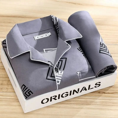 Men's pajama set featuring a button-down shirt and matching pants, designed for year-round comfort with soft, breathable fabric, ideal for restful sleep. 10