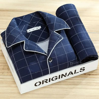 Men's pajama set featuring a button-down shirt and matching pants, designed for year-round comfort with soft, breathable fabric, ideal for restful sleep. 4