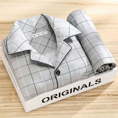 Men's pajama set featuring a button-down shirt and matching pants, designed for year-round comfort with soft, breathable fabric, ideal for restful sleep. 5