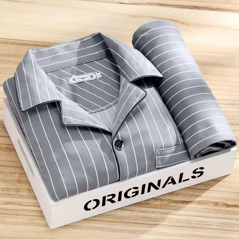 Men's pajama set featuring a button-down shirt and matching pants, designed for year-round comfort with soft, breathable fabric, ideal for restful sleep. 7