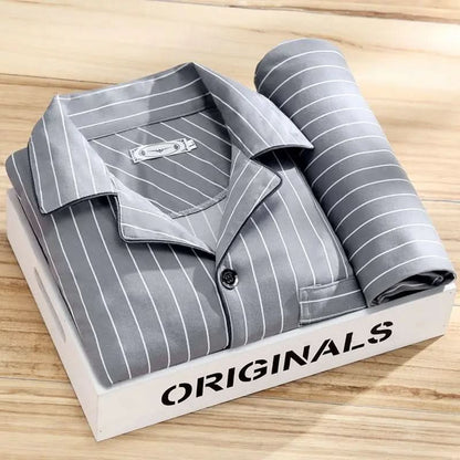 Men's pajama set featuring a button-down shirt and matching pants, designed for year-round comfort with soft, breathable fabric, ideal for restful sleep. 7