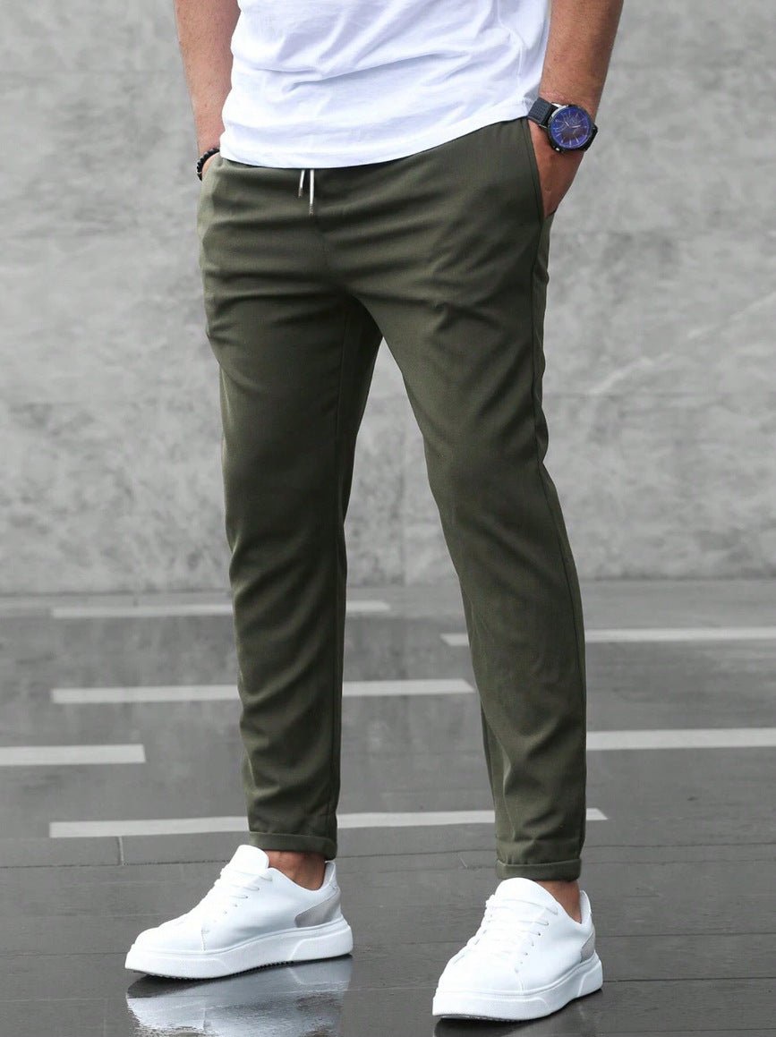 Men's pants featuring an elastic waistband for enhanced comfort, designed for modern everyday wear with a stylish and versatile look. 2
