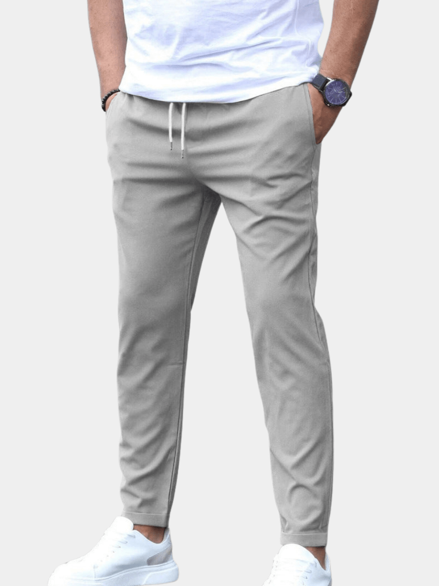 Men's pants featuring an elastic waistband for enhanced comfort, designed for modern everyday wear with a stylish and versatile look. 1