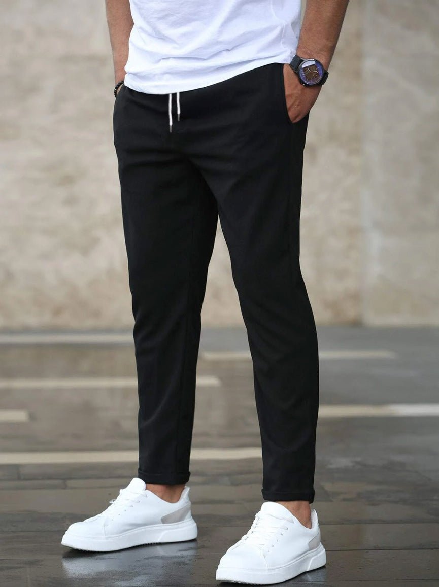 Men's pants featuring an elastic waistband for enhanced comfort, designed for modern everyday wear with a stylish and versatile look. 3