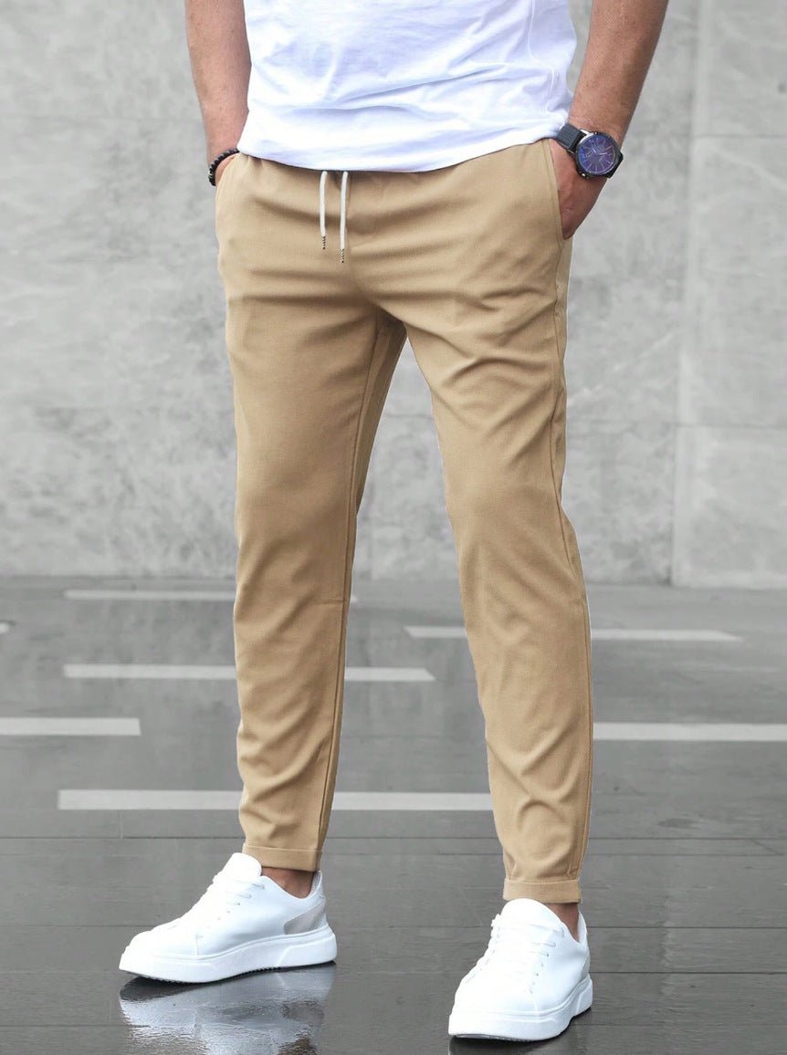 Men's pants featuring an elastic waistband for enhanced comfort, designed for modern everyday wear with a stylish and versatile look. 4