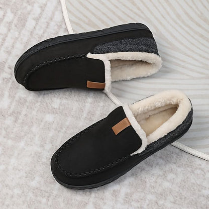 Men's slippers featuring a classic loafer design made with warm synthetic wool, perfect for winter comfort and relaxation. 0