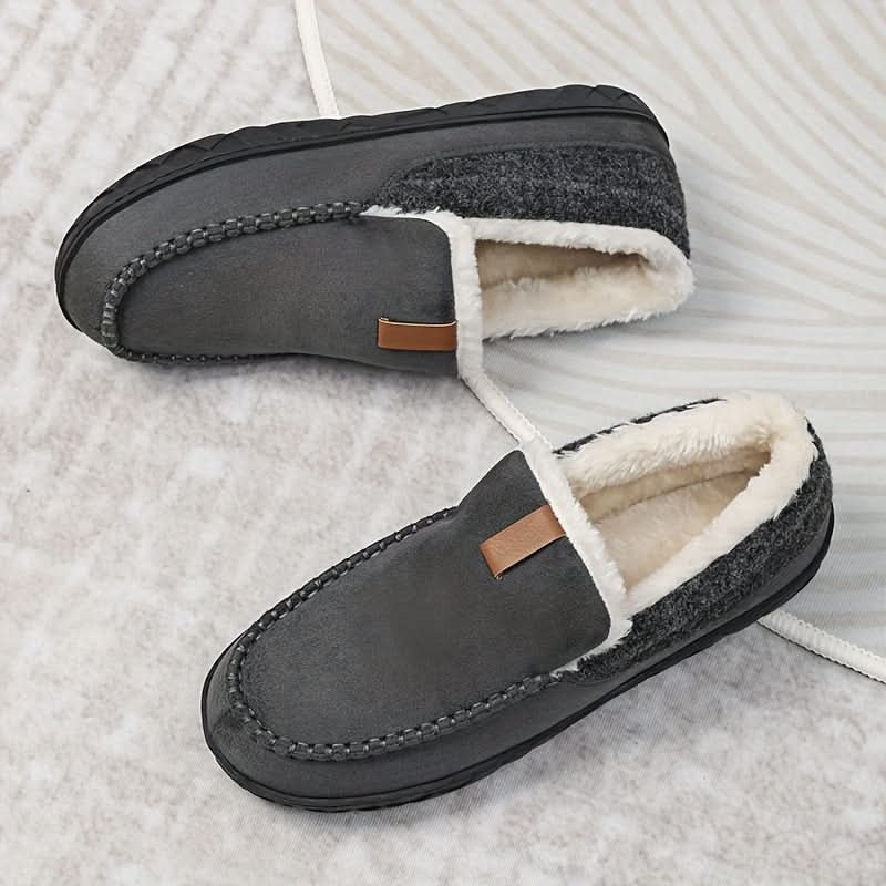 Men's slippers featuring a classic loafer design made with warm synthetic wool, perfect for winter comfort and relaxation. 8