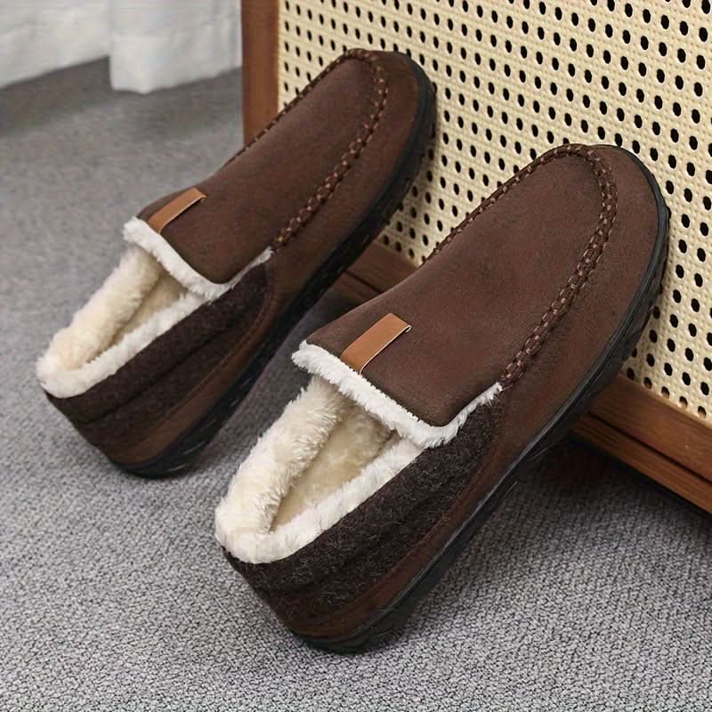Men's slippers featuring a classic loafer design made with warm synthetic wool, perfect for winter comfort and relaxation. 6