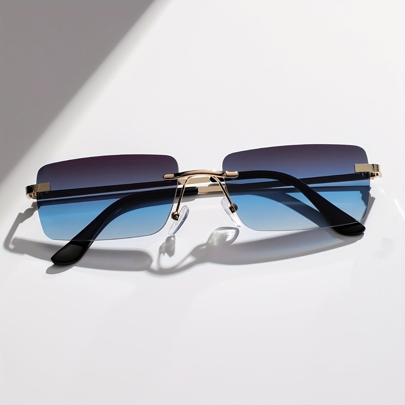 Men's sunglasses featuring a lightweight metal frame and frameless design, providing UV protection for stylish and comfortable outdoor wear. 3