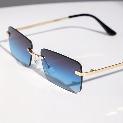 Men's sunglasses featuring a lightweight metal frame and frameless design, providing UV protection for stylish and comfortable outdoor wear. 2