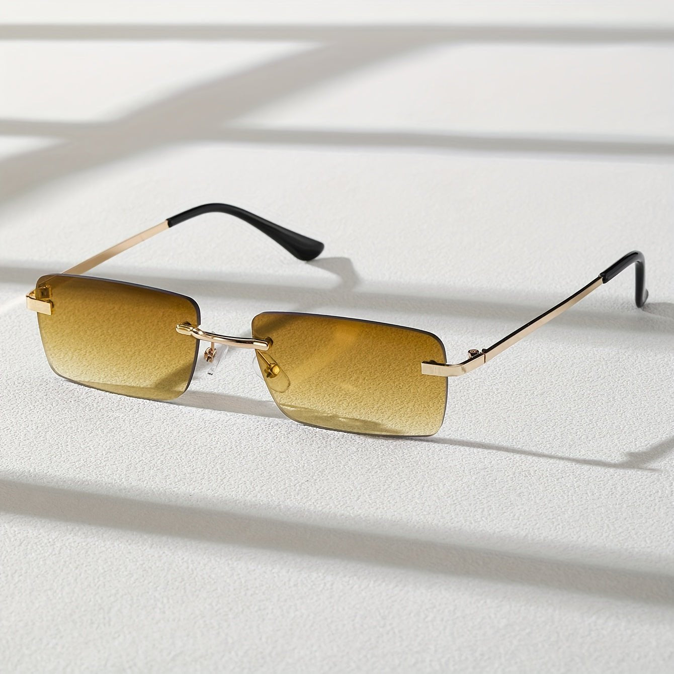 Men's sunglasses featuring a lightweight metal frame and frameless design, providing UV protection for stylish and comfortable outdoor wear. 6