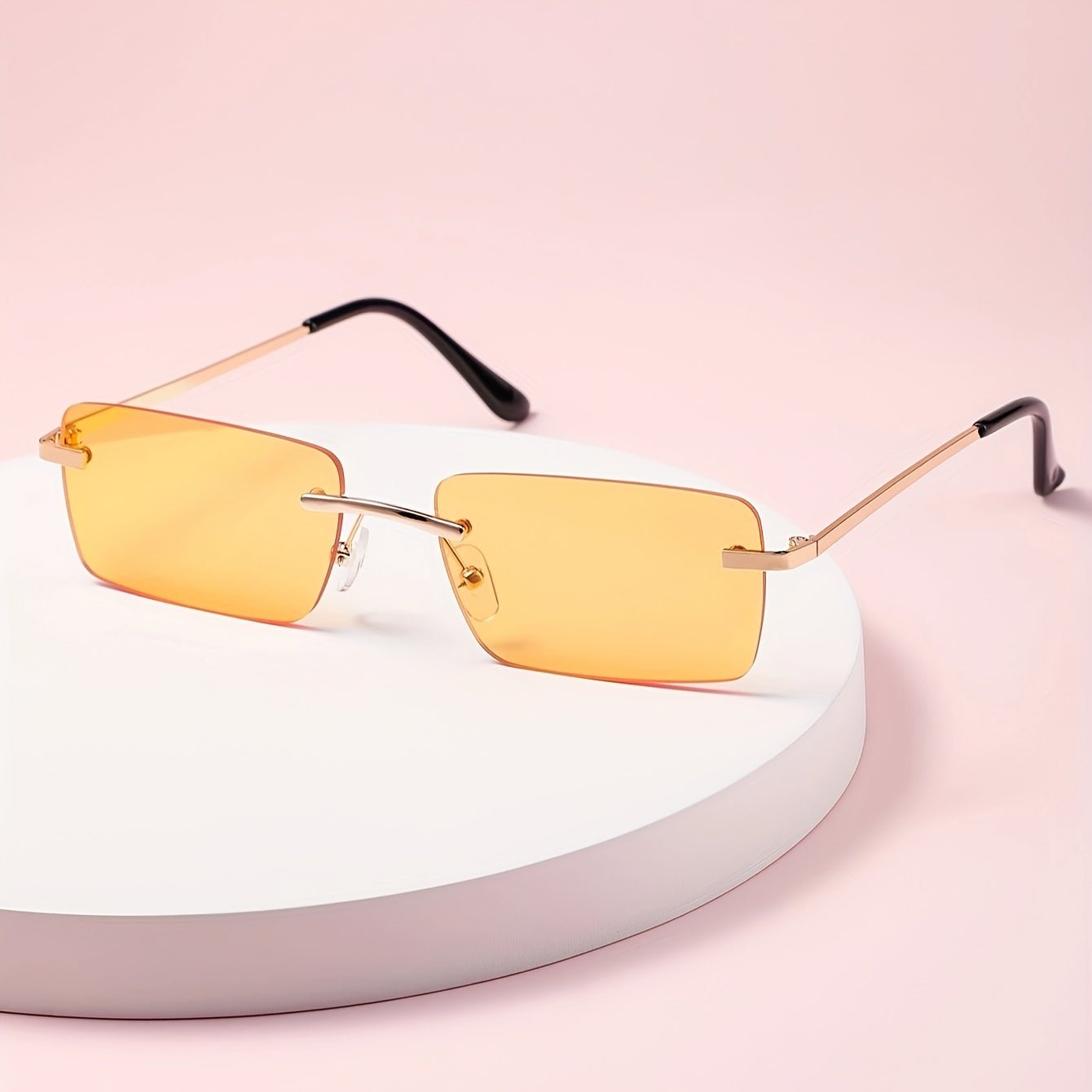 Men's sunglasses featuring a lightweight metal frame and frameless design, providing UV protection for stylish and comfortable outdoor wear. 9