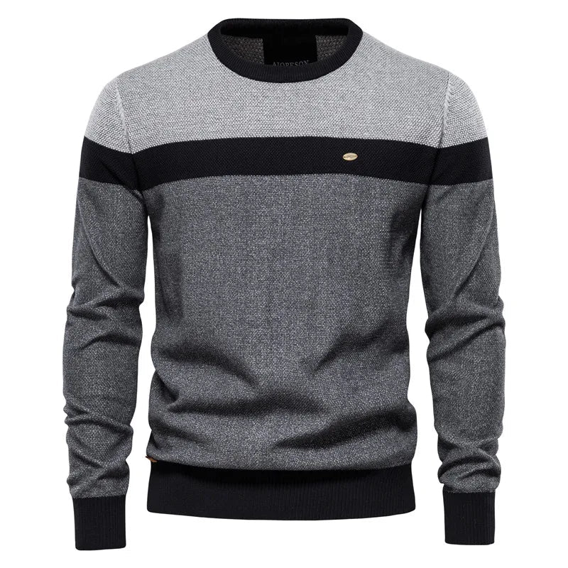 Men's blue sweater made from soft-knit fabric, featuring a classic elegant design for comfortable warmth and style. 1