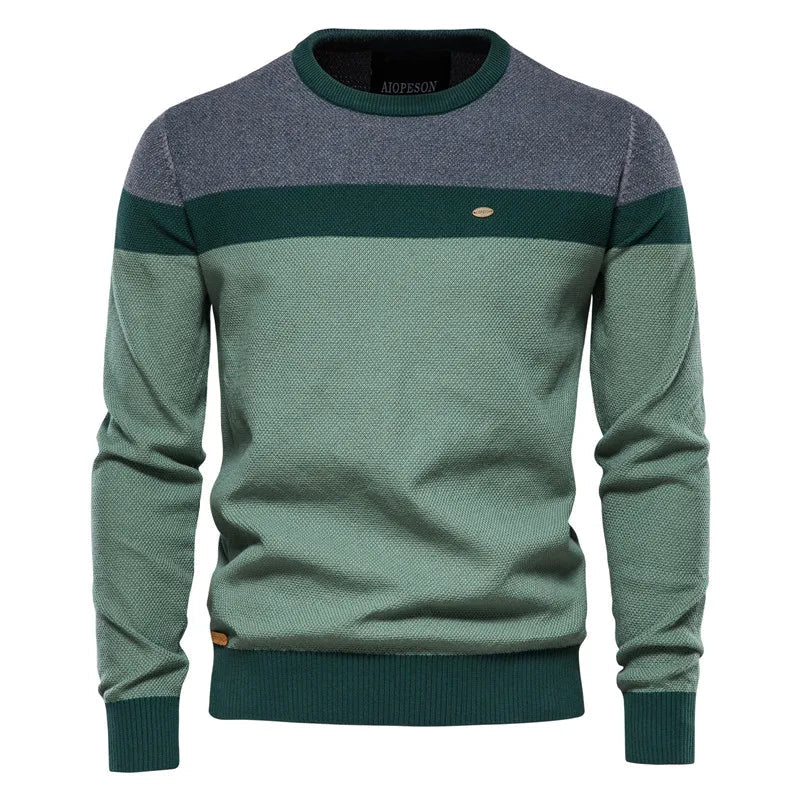Men's blue sweater made from soft-knit fabric, featuring a classic elegant design for comfortable warmth and style. 2