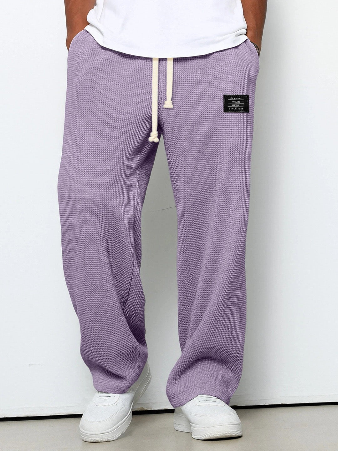 Men's trousers featuring an adjustable waistband and relaxed fit, made from breathable lightweight fabric, perfect for casual and smart wear. 9