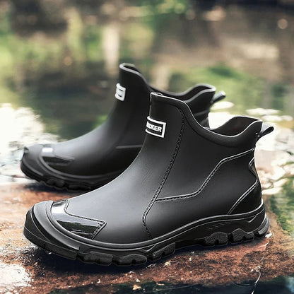 Men's lightweight waterproof ankle boots featuring an insulated design and anti-slip sole, perfect for outdoor adventures in wet conditions. 1