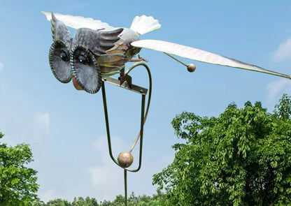 Metal Bird Wind Spinner Garden Ornament featuring moving wings, crafted from weather-resistant metal for durable outdoor decor, ideal for enhancing garden aesthetics. 6