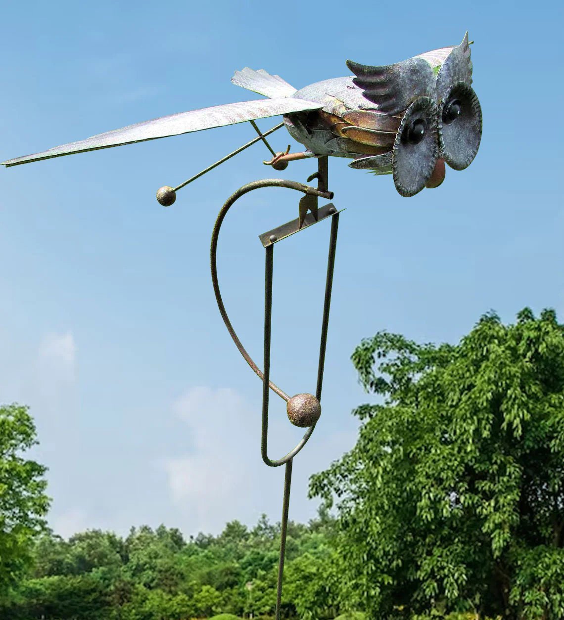 Metal Bird Wind Spinner Garden Ornament featuring moving wings, crafted from weather-resistant metal for durable outdoor decor, ideal for enhancing garden aesthetics. 7